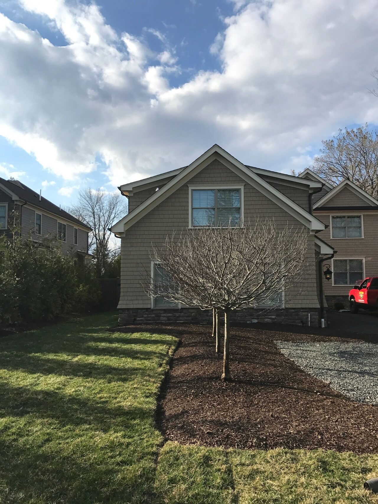 Princeton Junction NJ residential front yard with planting and walkway. Landscape work by New Dawn Landscaping.